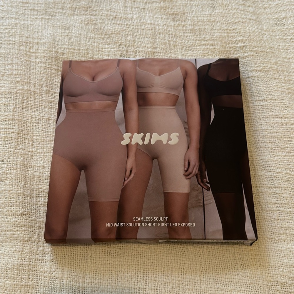 Skims shapewear shorts with right leg exposed